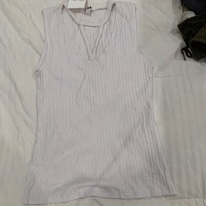 white sleeveless shirt